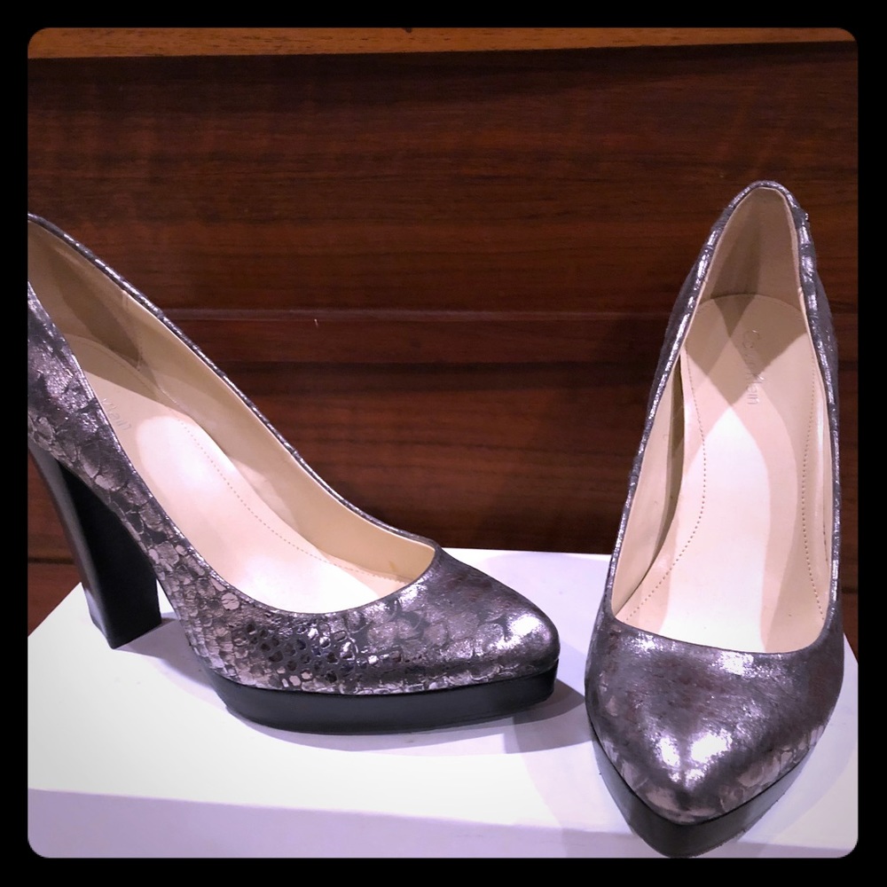 Calvin Klein silver reptile platform pumps